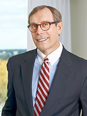 Portrait of John Strackhouse.