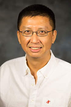 Color portrait of Min Ding