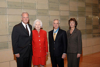 From left, Jim Thomas, former John and Becky Surma dean of Smeal; Mercedes Shoemaker; Jack Jacobs, guest lecturer and Medal of Honor recipient; and Linda Treviño, distinguished professor of Organizational Behavior and Ethics and director of the Shoemaker Program in Business Ethics, during the 2007 annual G. Albert Shoemaker Lecture in Business Ethics event. 