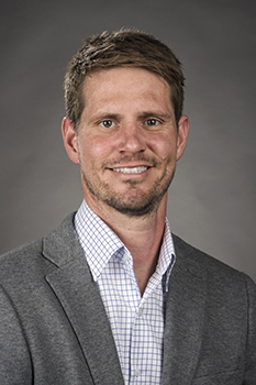 Color portrait of Sean Melessa.